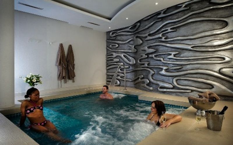 spa with indoor heated pool