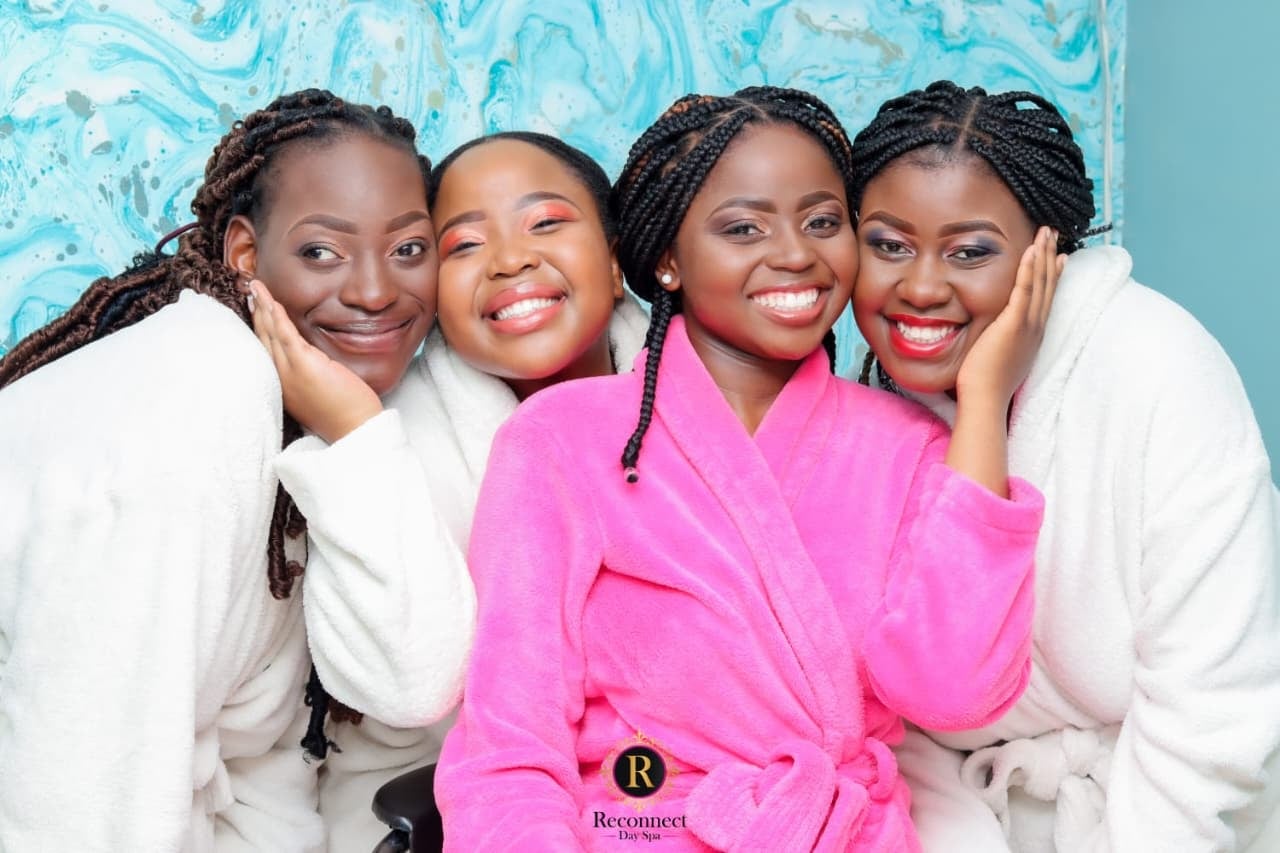 Group of friends in pink dresses celebrating in the spa garden – Friendship Code Spa Special for 4, Reconnect Day Spa