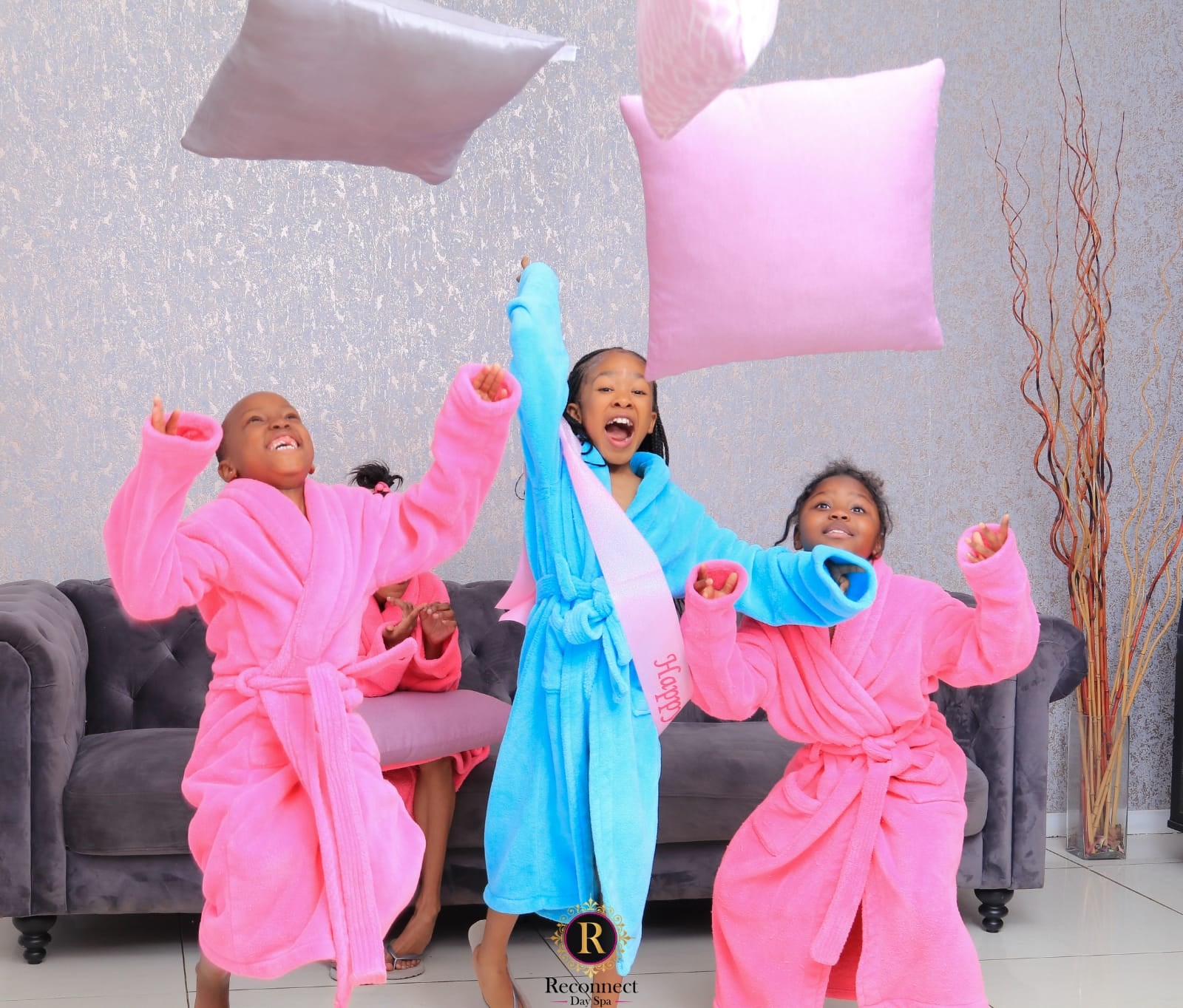 Mom and children in pink spa robes at a family photoshoot – Kids Spa Party Trio for 3, Reconnect Day Spa
